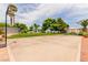 Community basketball court with well-maintained surface, surrounded by green space and landscaping at 3318 N Decatur Blvd # 1020, Las Vegas, NV 89130