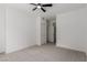 This is a bedroom with neutral carpeting, trim, and wall color at 3318 N Decatur Blvd # 1020, Las Vegas, NV 89130