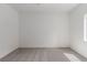 This bedroom is brightly lit with neutral carpeting and trim at 3318 N Decatur Blvd # 1020, Las Vegas, NV 89130