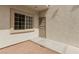 View of the entryway with a window and security gate at 3318 N Decatur Blvd # 1020, Las Vegas, NV 89130