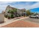 Exterior view of building with well-maintained landscaping, parking, and stair access at 3318 N Decatur Blvd # 1020, Las Vegas, NV 89130