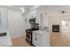 Kitchen with stainless steel appliances and adjacent living space at 3318 N Decatur Blvd # 1020, Las Vegas, NV 89130