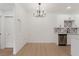 Kitchen and dining area with stainless steel appliances and stylish backsplash at 3318 N Decatur Blvd # 1020, Las Vegas, NV 89130