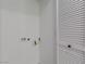 Laundry area ready for appliance hookups, adjacent to a closet with louvered doors at 3318 N Decatur Blvd # 1020, Las Vegas, NV 89130