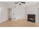 Living room with modern ceiling fan and neutral-toned wood-look flooring at 3318 N Decatur Blvd # 1020, Las Vegas, NV 89130