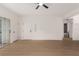 Open living space boasting neutral walls, wood flooring, bathroom and sliding glass doors at 3318 N Decatur Blvd # 1020, Las Vegas, NV 89130