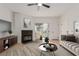 Bright living room featuring fireplace, modern furnishings, and sliding doors for natural light at 3318 N Decatur Blvd # 1020, Las Vegas, NV 89130