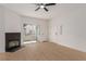 Bright living room features a fireplace and sliding doors to a patio at 3318 N Decatur Blvd # 1020, Las Vegas, NV 89130