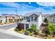Charming two-story home with landscaped front yard and covered porch in a well-maintained community with mountain views at 3531 Montepulciano Ln, Henderson, NV 89044