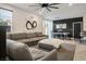 Open living room featuring a comfortable seating area and modern decor at 3531 Montepulciano Ln, Henderson, NV 89044