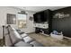 Entertainment room with movie-themed decor, theater seating, and a large screen TV at 3531 Montepulciano Ln, Henderson, NV 89044