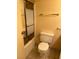 Cozy bathroom with tiled floors, shower over tub with glass doors and a standard toilet at 3930 University Center Dr # 612, Las Vegas, NV 89119