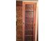 Unique closet door with carved decorative wood panels, creating a focal point in the room at 3930 University Center Dr # 612, Las Vegas, NV 89119