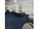 Conference room with large table, executive chairs, and contemporary art at 3930 University Center Dr # 612, Las Vegas, NV 89119
