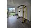 Fully-equipped gym features a power rack, weights, and large window at 3930 University Center Dr # 612, Las Vegas, NV 89119