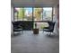 Modern lobby featuring comfortable chairs, plant, and bright natural light creating inviting atmosphere at 3930 University Center Dr # 612, Las Vegas, NV 89119