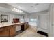Well-lit bathroom with double sinks, bathtub, and walk-in shower at 405 Prairie Moon Ave, North Las Vegas, NV 89084