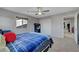 Bedroom with ceiling fan, neutral walls and carpet at 405 Prairie Moon Ave, North Las Vegas, NV 89084