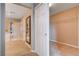 Dual closet view with a peek into the bathroom, boasting an open design at 405 Prairie Moon Ave, North Las Vegas, NV 89084