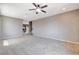Spacious living room featuring neutral carpet and ample natural light at 405 Prairie Moon Ave, North Las Vegas, NV 89084