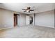 Open loft space featuring neutral walls, plush carpeting, and versatile layout at 405 Prairie Moon Ave, North Las Vegas, NV 89084