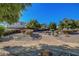 Scenic view of a neighborhood park with desert landscaping, walking paths, and inviting community spaces at 405 Prairie Moon Ave, North Las Vegas, NV 89084