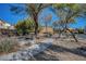 Park area with manicured grounds, mature trees, and walking paths is a great spot for relaxation at 405 Prairie Moon Ave, North Las Vegas, NV 89084