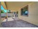 Covered patio featuring brick pavers and backyard views at 405 Prairie Moon Ave, North Las Vegas, NV 89084
