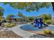 Community playground featuring modern play equipment, a picnic area, and landscaping at 405 Prairie Moon Ave, North Las Vegas, NV 89084