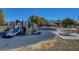 Community playground featuring climbing and sliding areas with picnic tables for Gathering activities at 405 Prairie Moon Ave, North Las Vegas, NV 89084