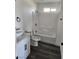 The stylish bathroom features a modern vanity and a shower-tub combo at 4231 E Kellogg Rd, Pahrump, NV 89061