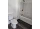 The updated bathroom features a standard white toilet and a shower-tub combo at 4231 E Kellogg Rd, Pahrump, NV 89061