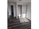 This bedroom features a spacious closet and modern flooring for a cozy and stylish living space at 4231 E Kellogg Rd, Pahrump, NV 89061