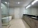 A luxurious bathroom with a soaking tub and double sink vanity at 4525 Dean Martin Dr # 1507, Las Vegas, NV 89103