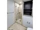 Bathroom with tiled shower, glass door, towel bar and cabinet at 4525 Dean Martin Dr # 1507, Las Vegas, NV 89103
