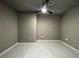 Neutral-toned bedroom featuring a ceiling fan and blank walls at 4525 Dean Martin Dr # 1507, Las Vegas, NV 89103