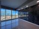 Bright room with expansive windows and city views featuring reflective tile floors and recessed lighting at 4525 Dean Martin Dr # 1507, Las Vegas, NV 89103