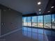 Bright room with expansive windows and city views featuring reflective tile floors and recessed lighting at 4525 Dean Martin Dr # 1507, Las Vegas, NV 89103