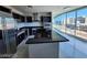 Modern kitchen with stainless steel appliances, breakfast bar and views at 4525 Dean Martin Dr # 1507, Las Vegas, NV 89103