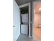 Stacked washer and dryer hookups in a dedicated laundry closet near bathroom at 4525 Dean Martin Dr # 1507, Las Vegas, NV 89103