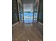 Bright living room featuring tiled floors and city views from floor-to-ceiling windows at 4525 Dean Martin Dr # 1507, Las Vegas, NV 89103