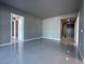 Bright living room boasts tile flooring and neutral paint, offering a modern and clean aesthetic at 4525 Dean Martin Dr # 1507, Las Vegas, NV 89103