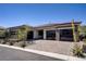 Beautiful single-story home featuring a three-car garage and desert landscaping at 47 Garibaldi Way, Henderson, NV 89011