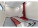 Bright garage has car lift for the auto enthusiast at 47 Garibaldi Way, Henderson, NV 89011