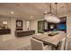 Elegant living room and dining area with fireplace and modern decor at 47 Garibaldi Way, Henderson, NV 89011