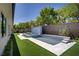 Stunning pool and spa feature tiled accents, a water feature, and pristine landscaping at 47 Garibaldi Way, Henderson, NV 89011