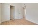 Bedroom with wood-look floors and closet at 49 Constitution Ave, Henderson, NV 89015