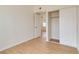 Bedroom with wood-look floors and closet at 49 Constitution Ave, Henderson, NV 89015