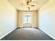 Spacious bedroom featuring a large window and neutral walls at 5451 Fernwood Ct, Pahrump, NV 89061