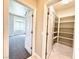 Hallway view of bedroom and walk-in closet at 5451 Fernwood Ct, Pahrump, NV 89061